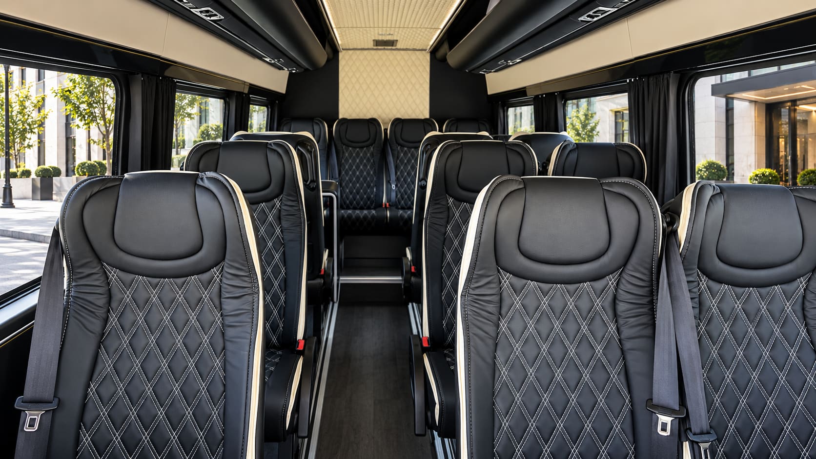 Interior of the Mercedes-Benz Sprinter with black diamond-stitched leather seats and a centre aisle